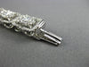 LARGE 7.05CT ROUND & BAGUETTE DIAMOND 18KT WHITE GOLD 3D CLUSTER TENNIS BRACELET