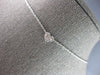 .12CT DIAMOND 14K WHITE GOLD ROUND & BAGUETTE INVISIBLE HEART SHAPE LOVE PENDANT