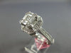 LARGE 1.68CT DIAMOND 18KT WHITE GOLD ROUND & BAGUETTE INVISIBLE ENGAGEMENT RING