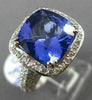 ESTATE LARGE 6.43CT DIAMOND & AAA TANZANITE 18KT WHITE 3D HALO ENGAGEMENT RING