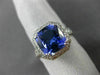 ESTATE LARGE 5.52CT DIAMOND & AAA TANZANITE PLATINUM GOLD HALO ENGAGEMENT RING