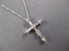 .33CT DIAMOND 18KT WHITE GOLD 3D CLASSIC ROUND & BAGUETTE CROSS FLOATING PENDANT