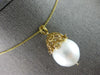 LARGE .10CT DIAMOND & AAA SOUTH SEA PEARL 18KT YELLOW GOLD MULTI FLOWER PENDANT