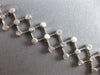 ESTATE .52CT DIAMOND 14K WHITE GOLD BEZEL ETOILE CRISS CROSS FUN TENNIS BRACELET