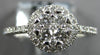 ESTATE .52CT DIAMOND 18KT WHITE GOLD ROUND 3D FLOWER HALO FRIENDSHIP LOVE RING