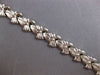 ESTATE WIDE 14KT WHITE GOLD 3D CLASSIC MATTE & SHINY MULTI BOW FUN BRACELET
