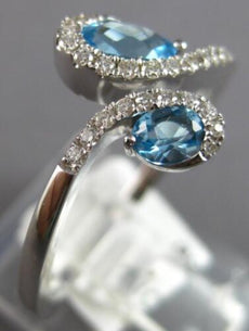 .81CT DIAMOND & AAA BLUE TOPAZ 14KT WHITE GOLD 3D PEAR SHAPE & ROUND LOVE RING