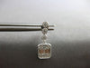 ESTATE .45CT DIAMOND 14KT WHITE GOLD ROUND & BAGUETTE INVISIBLE HANGING EARRINGS