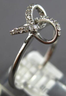 ESTATE .12CT DIAMOND 14K WHITE GOLD 3D CLASSIC LOVE KNOT INFINITY STAR LOVE RING