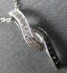 ESTATE .04CT WHITE AND BLACK DIAMOND 14K WHITE GOLD 3D INFINITY FLOATING PENDANT