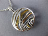 ESTATE .86CT DIAMOND 18KT TRI COLOR GOLD 3D CIRCULAR CRISS CROSS FUN PENDANT