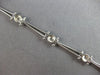 .26CT DIAMOND 14KT WHITE GOLD ROUND BEZEL ETOILE TRIANGULAR FUN TENNIS BRACELET