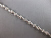 ESTATE .50CT DIAMOND 14K WHITE GOLD BEZEL ETOILE CRISS CROSS FUN TENNIS BRACELET