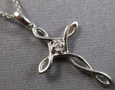 ESTATE .02CT DIAMOND 14KT WHITE GOLD SOLITAIRE INFINITY CROSS FLOATING PENDANT