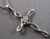 ESTATE .02CT DIAMOND 14KT WHITE GOLD SOLITAIRE INFINITY CROSS FLOATING PENDANT