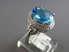 3.53CT DIAMOND & AAA BLUE TOPAZ 14KT WHITE GOLD OVAL & ROUND HALO LOVE KNOT RING