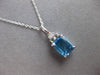 2.58CT DIAMOND & AAA BLUE TOPAZ 14KT WHITE GOLD 3D EMERALD CUT & ROUND PENDANT