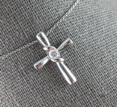 ESTATE .08CT DIAMOND 14KT WHITE GOLD 3D CLASSIC SOLITAIRE CROSS FLOATING PENDANT