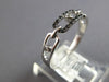 ESTATE .09CT WHITE & BLACK DIAMOND 14KT WHITE GOLD 3D OVAL LOVE KNOT FUN RING