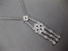 .36CT DIAMOND 14KT WHITE GOLD DOUBLE FLOWER FILIGREE CHANDELIER LARIAT NECKLACE