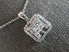 ESTATE .60CT DIAMOND 14KT WHITE GOLD ROUND PRINCESS & BAGUETTE FLOATING PENDANT