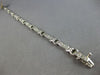 ESTATE LONG 2.60CT DIAMOND 14KT WHITE GOLD ROUND CHANNEL X LOVE TENNIS BRACELET