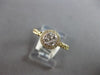 ESTATE .13CT DIAMOND 14KT WHITE GOLD 3D ROUND CLUSTER INVISIBLE HALO FUN RING