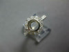 WIDE .55CT DIAMOND 18KT WHITE GOLD BEZEL ROUND HALO SEMI MOUNT ENGAGEMENT RING