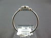 SMALL .31CT DIAMOND & AAA SAPPHIRE 18KT WHITE GOLD EMERALD CUT & ROUND FUN RING