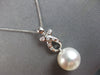 LARGE .13CT DIAMOND & AAA SOUTH SEA PEARL 18K WHITE GOLD ETOILE FLOATING PENDANT