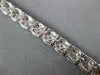 ESTATE WIDE 5.52CT DIAMOND 18KT WHITE GOLD 3D CLUSTER ROUND TENNIS BRACELET