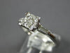 .50CT DIAMOND 18KT WHITE GOLD PRINCESS & BAGUETTE 3D INVISIBLE ENGAGEMENT RING
