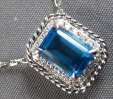 1.34CT DIAMOND & AAA BLUE TOPAZ 14KT WHITE GOLD 3D EMERALD CUT & ROUND PENDANT