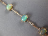 5.12CT DIAMOND & AAA OPAL 14KT ROSE GOLD OVAL & ROUND BAMBOO TENNIS BRACELET