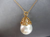 LARGE .10CT DIAMOND & AAA SOUTH SEA PEARL 18KT ROSE GOLD OPEN FILIGREE PENDANT