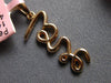 ESTATE .16CT DIAMOND 14KT ROSE GOLD 3D SCRIPT LOVE FLOATING PENDANT