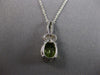2.29CT DIAMOND & AAA PERDIOT 14KT WHITE GOLD OVAL & ROUND FUN FLOATING PENDANT