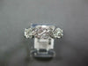 ESTATE .06CT DIAMOND 18KT WHITE GOLD MULTI LEAF OPEN FILIGREE ANNIVERSARY RING