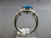 3.53CT DIAMOND & AAA BLUE TOPAZ 14KT WHITE GOLD OVAL & ROUND HALO LOVE KNOT RING