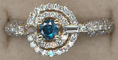.77CT WHITE & BLUE DIAMOND 14KT WHITE GOLD 3D ROUND & BAGUETTE ENGAGEMENT RING