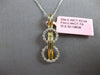 .70CT WHITE & FANCY YELLOW DIAMOND 18KT 2 TONE GOLD ROUND & BAGUETTE 3D PENDANT