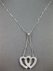 ESTATE .40CT DIAMOND 14KT WHITE GOLD CLASSIC DOUBLE HEART LARIAT LOVE NECKLACE