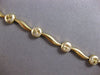 CLASSIC 14KT WHITE & YELLOW GOLD 3D MULTI CIRCULAR DIAMOND CUT WAVE FUN BRACELET