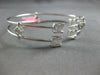 WIDE 1.0CT DIAMOND 18KT WHITE GOLD 3D ROUND & BAGUETTE INVISIBLE BANGLE BRACELET
