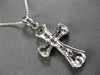 ESTATE .18CT DIAMOND 14KT WHITE GOLD MATTE & SHINY ETOILE CROSS FLOATING PENDANT
