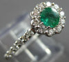 ESTATE .87CT DIAMOND & AAA EMERALD 14KT WHITE GOLD CLASSIC ROUND FLOWER FUN RING