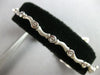 .39CT DIAMOND 14KT WHITE GOLD 3D ETOILE MATTE & SHINY MULTI WAVE TENNIS BRACELET