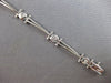 .26CT DIAMOND 14KT WHITE GOLD ROUND BEZEL ETOILE TRIANGULAR FUN TENNIS BRACELET