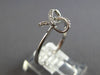 ESTATE .12CT DIAMOND 14K WHITE GOLD 3D CLASSIC LOVE KNOT INFINITY STAR LOVE RING
