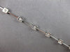 .42CT DIAMOND 14K WHITE GOLD ROUND ETOILE BY THE YARD SQUARE FUN TENNIS BRACELET